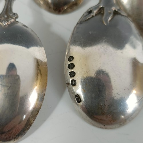 75 - Assorted silver coloured metal and other travel/commemorative spoons, some with enamel decoration