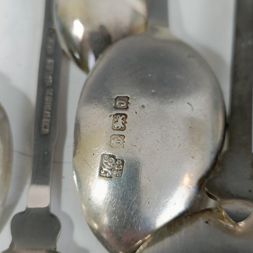 77 - Assorted silver coloured metal and other travel/commemorative spoons, some with enamel decoration