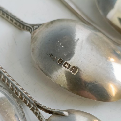 78 - Assorted silver coloured metal and other travel/commemorative spoons, some with enamel decoration