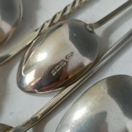 80 - Assorted silver coloured metal and other travel/commemorative spoons, some with enamel decoration