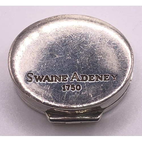 288 - A George V silver sovereign holder, a silver mounted wine stopper, and an oval box