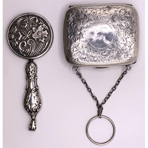 290 - A George V silver purse, and a silver cased miniature hand mirror (2)