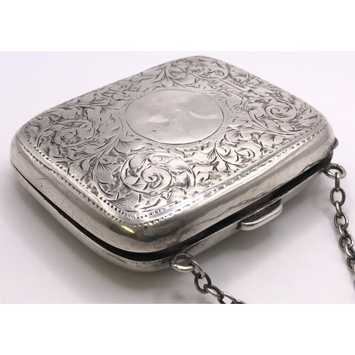 290 - A George V silver purse, and a silver cased miniature hand mirror (2)