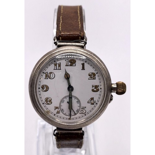 762 - A 1920s gentleman's silver wristwatch, with a later leather strap