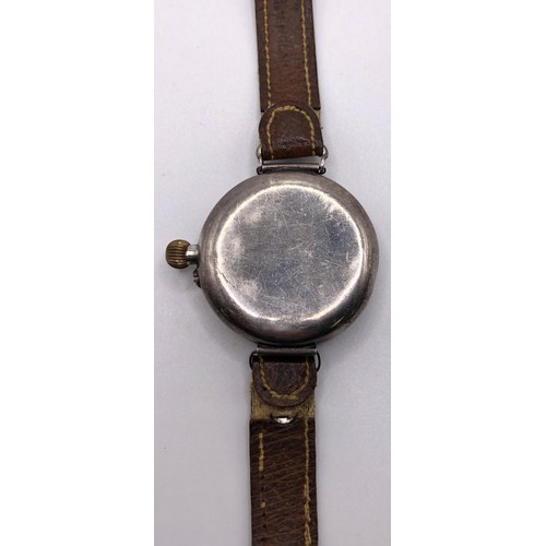 762 - A 1920s gentleman's silver wristwatch, with a later leather strap