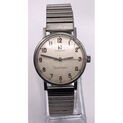 765 - A gentleman's stainless steel Tissot Seastar Seven wristwatch, on an expandable strap, and a gentlem... 