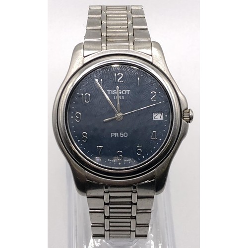 765 - A gentleman's stainless steel Tissot Seastar Seven wristwatch, on an expandable strap, and a gentlem... 