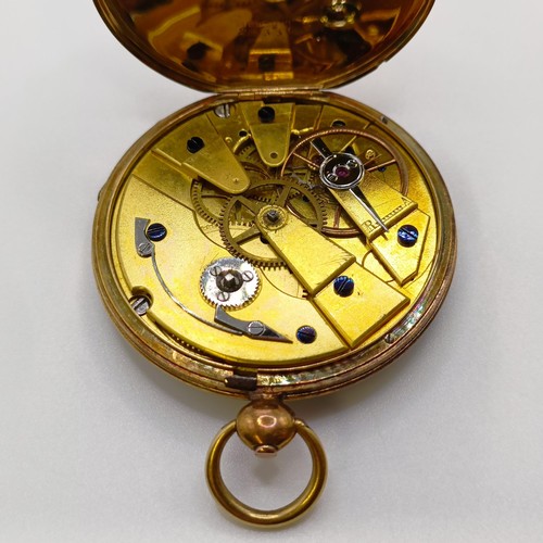 772 - An open face pocket watch, in a yellow metal case