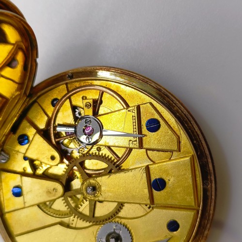 772 - An open face pocket watch, in a yellow metal case