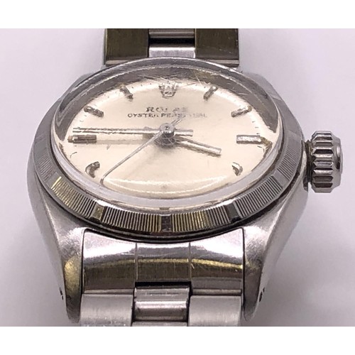 779 - A ladies stainless steel Rolex Oyster Perpetual wristwatch, with extra links, boxed with paperwork