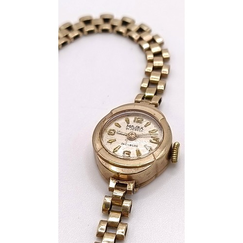 784 - A ladies 9ct gold Majex wristwatch