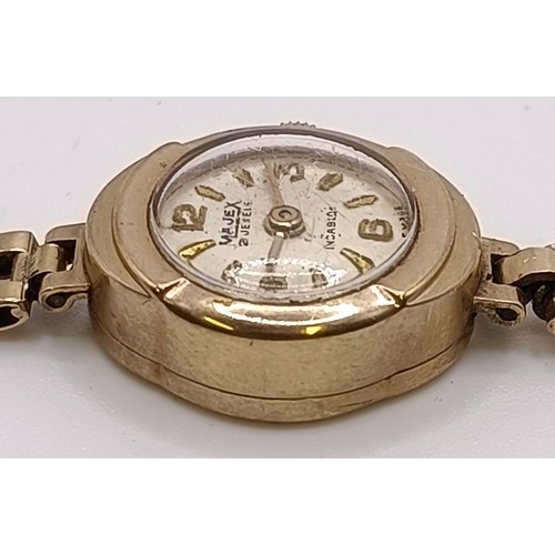 784 - A ladies 9ct gold Majex wristwatch