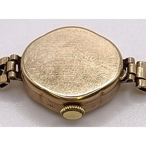 784 - A ladies 9ct gold Majex wristwatch