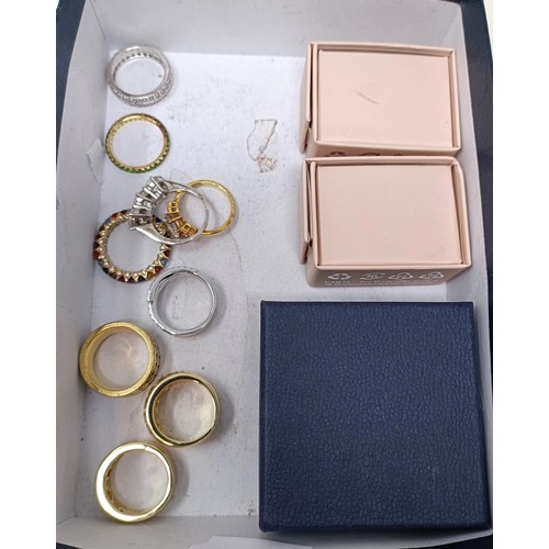 735 - A rose gold plated and cubic zirconia ring, and assorted other dress rings