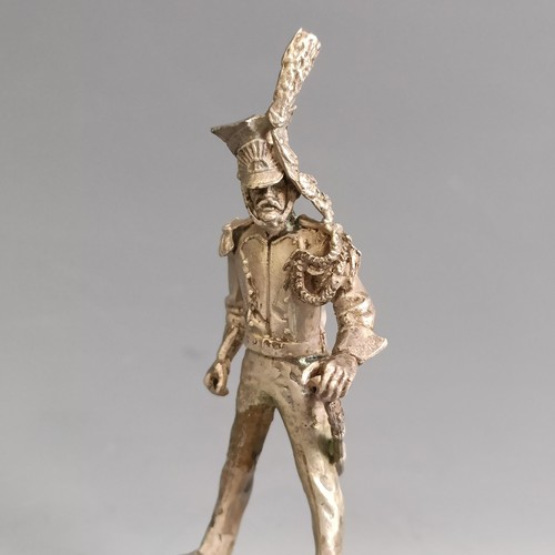 309 - A small silver figure of a Victorian Officer, Sheffield 1901, 1.3 ozt, 7.5 cm high