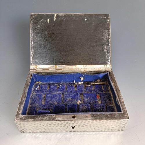 334 - A silver mounted fishing box, initialled, with  hammered decoration, London 1905, 13 cm wide