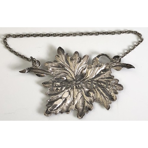 166 - A Victorian silver decanter label, Madeira, in the form of a vine leaf, Birmingham 1853, a silver an... 