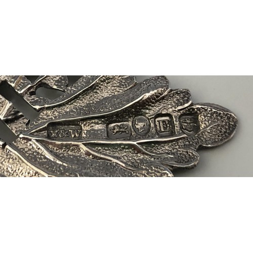 166 - A Victorian silver decanter label, Madeira, in the form of a vine leaf, Birmingham 1853, a silver an... 