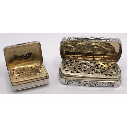 165 - A Victorian silver vinaigrette, of rounded rectangular form, engraved scrolling foliage, Birmingham ... 