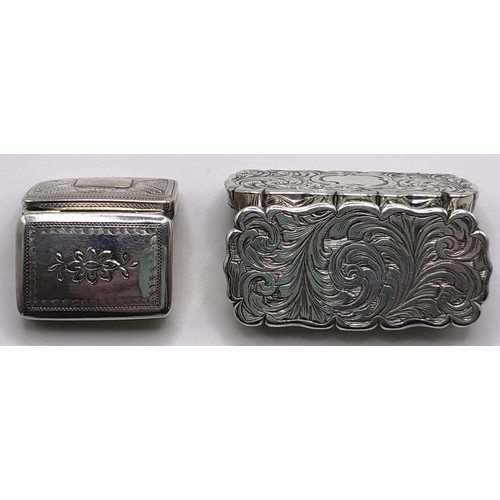 165 - A Victorian silver vinaigrette, of rounded rectangular form, engraved scrolling foliage, Birmingham ... 