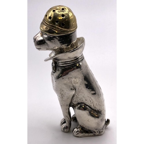 161 - A modern silver and silver gilt pepperette, in the form of a seated dog, wearing a cap, London 2001,... 