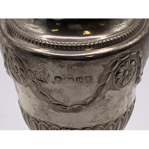 155 - A Victorian silver pepperette, in the form of an Adams style urn, Sheffield 1882, 8.5 cm high, anoth... 