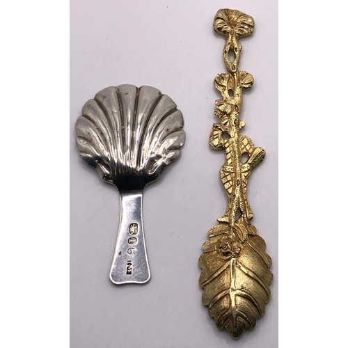 150 - A William IV silver gilt naturalistic spoon, with a harlequin handle, London 1836, and a silver cadd... 