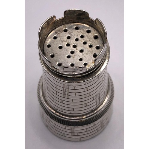 145 - A Victorian silver pepperette, in the form of a castellated turret, crested, Birmingham 1873, 1.5 oz... 