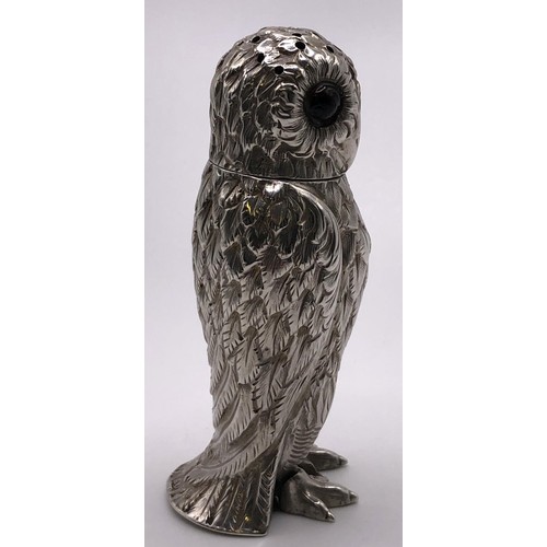 142 - A Victorian silver pepperette, in the form of an owl, George Unite, Birmingham 1882, 1.4 ozt, 7.5 cm... 