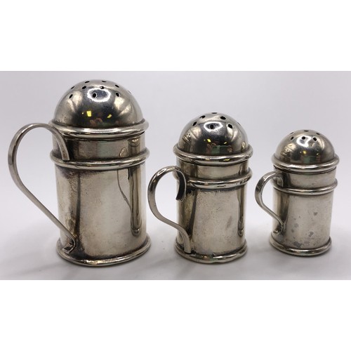 139 - A silver pepperette, in the form of a caster, Birmingham 1902, 4.5 cm high, and two others, 3 cm and... 