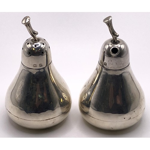 137 - A pair of silver condiments, in the form of pears, Birmingham 1909, 0.8 ozt, 6 cm high (2)