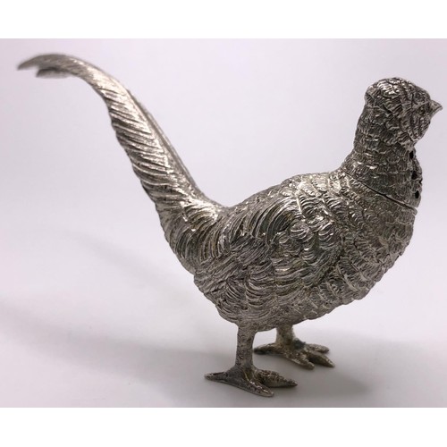 133 - A pair of silver pepperettes, in the form of a cock and a hen pheasant, London 1924, 3.1 ozt, the co... 