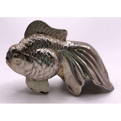 132 - A pair of silver coloured metal pepperettes, in the form of fish, 4 cm high, and a modern silver pin... 