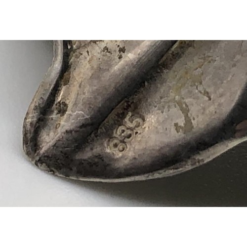 132 - A pair of silver coloured metal pepperettes, in the form of fish, 4 cm high, and a modern silver pin... 