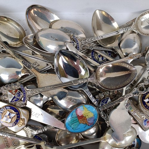 18 - Assorted silver coloured metal, silver plate and other spoons, including Orient Line, SS Orcades, SS... 