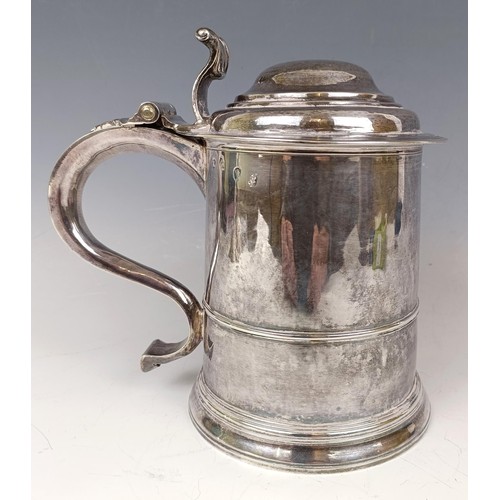 21 - An early 18th century silver lidded tankard, Joseph Clare, London 1714, 21.8 ozt