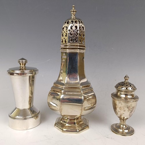 35 - A silver sugar caster, Sheffield 1923, a silver pepperette, 4.7 ozt, and a silver mounted peppermill... 