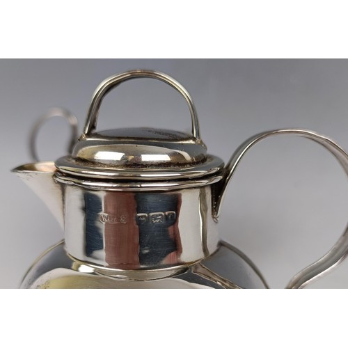 36 - A silver cream jug, in the form of a Guernsey milk jug, probably Birmingham 1905, and a silver cream... 