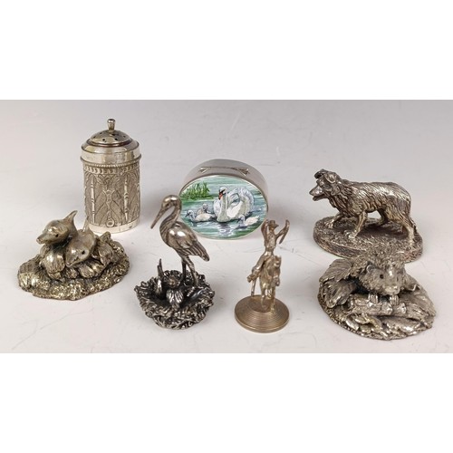 42 - A silver pill box, the top decorated a swan, a silver coloured metal pepperette, and other items