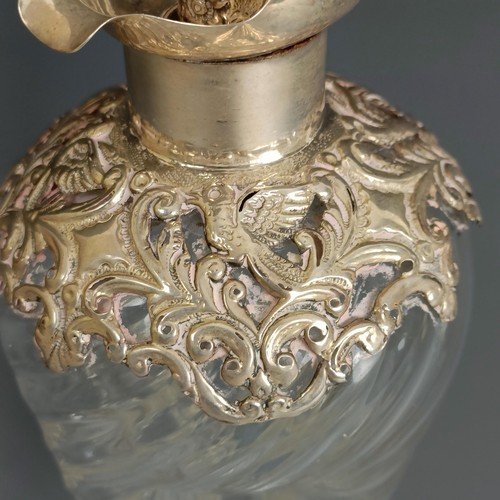 368 - A silver mounted glass decanter and stopper, of hour glass form, marks rubbed, 24.5 cm high