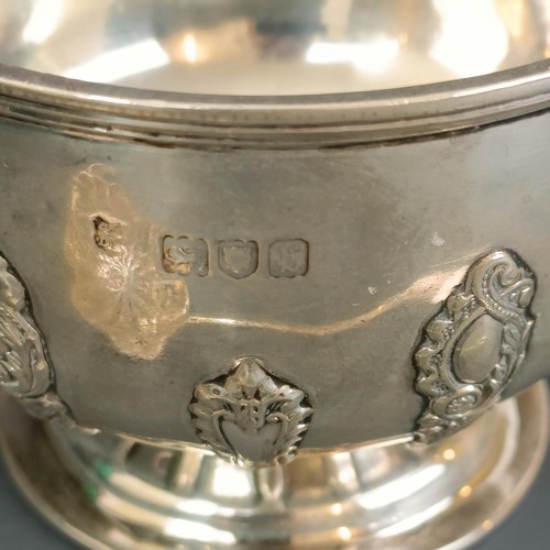 381 - A silver sugar bowl and a silver sifter spoon, London 1896/97, boxed