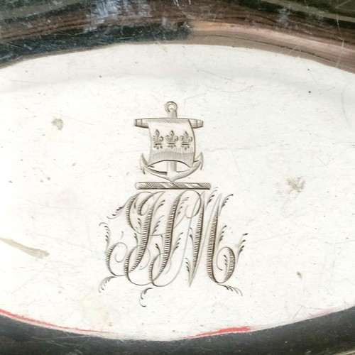 384 - A late 18th century silver swing handled basket, of navette form, initialled beneath a crest, and wi... 