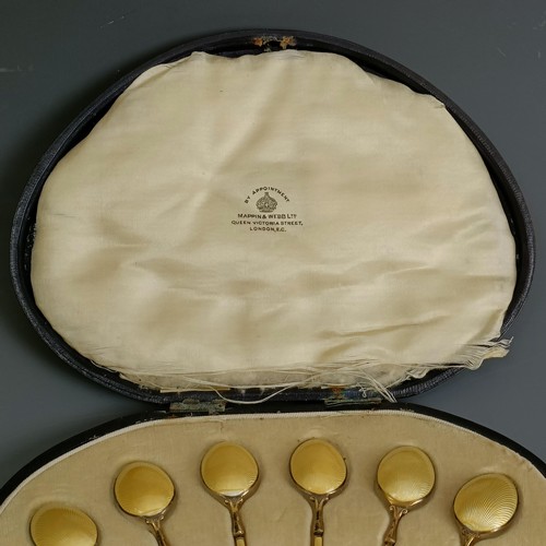 396 - A set of six silver gilt and yellow enamel teaspoons, boxed