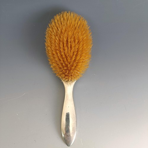 398 - A silver and tortoiseshell mounted hairbrush