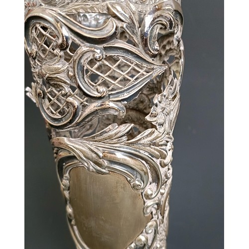 400 - A George V silver cream jug, 2.1 ozt, and a pierced silver vase, almost split into two pieces, base ... 