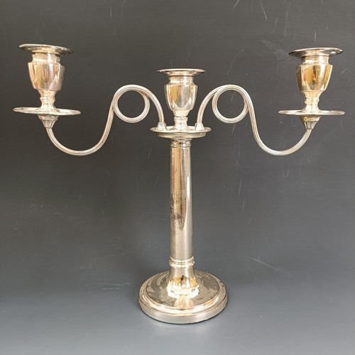 404 - A pair of Old Sheffield plate three light candelabra, crested, 32 cm high (2)