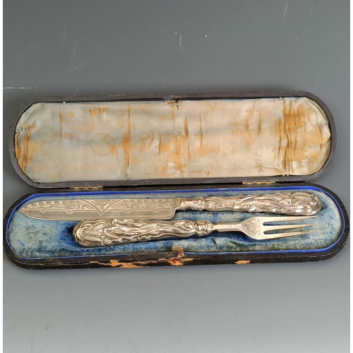 405 - A silver knife and fork set, the handles decorated bullrushes, Birmingham 1871, boxed