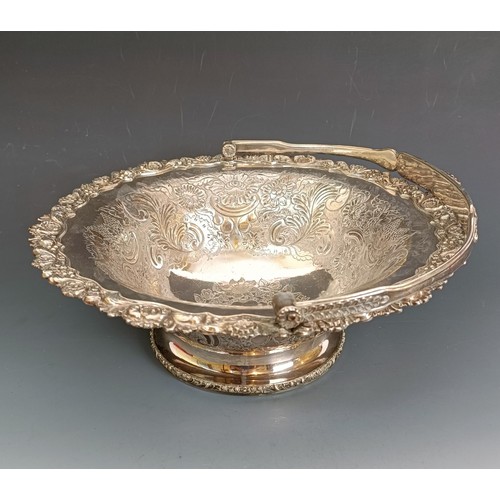 411 - A Victorian silver plated swing handled cake basket, 30 cm diameter