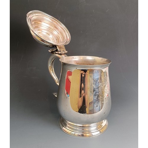 412 - An 18th century style silver plated tankard, The Benjamin Franklin Tankard, with engraved decoration... 