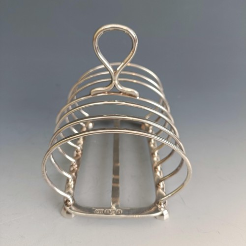 418 - A silver six division toast rack, Sheffield 1906, 5.0 ozt